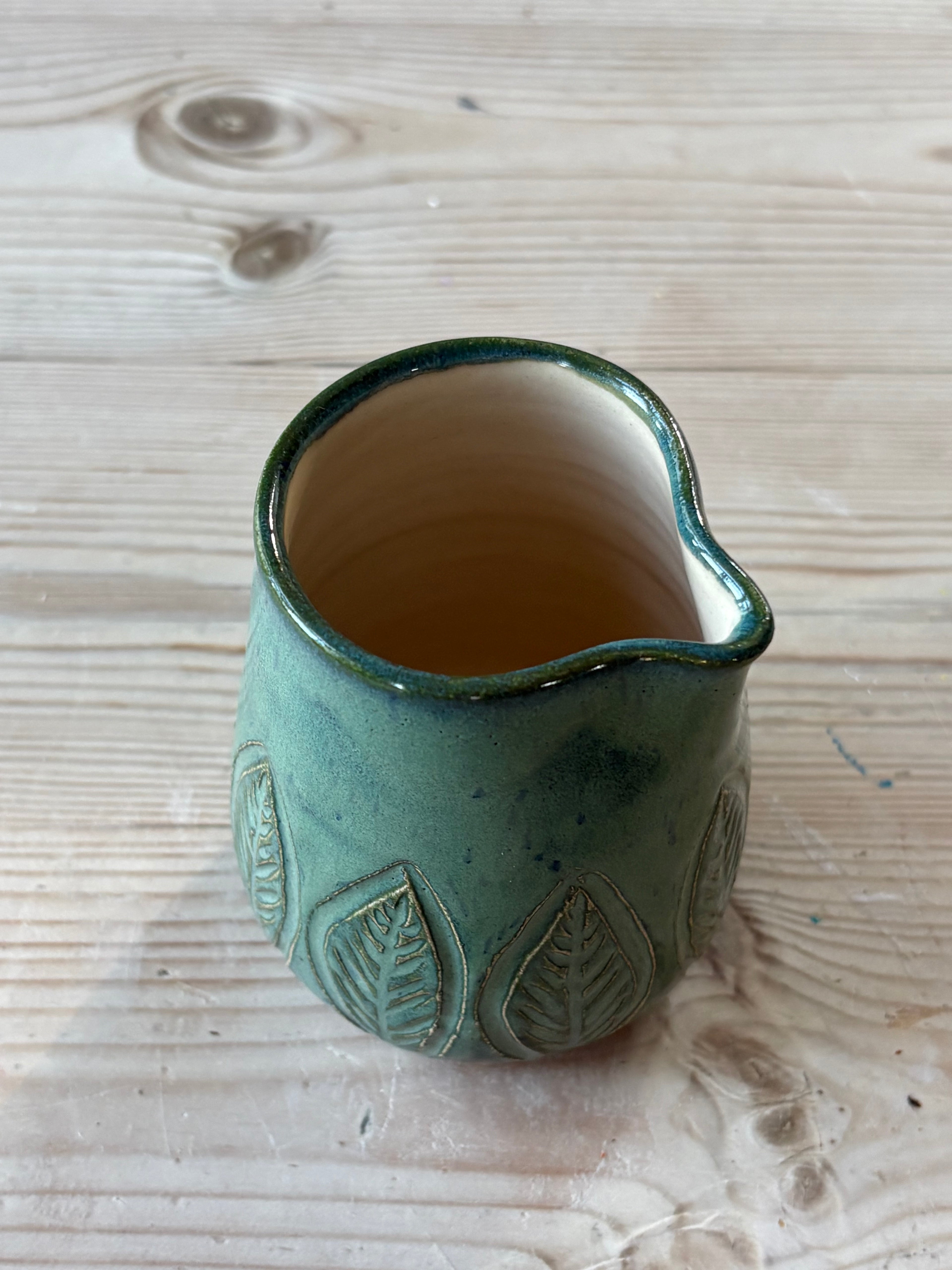 Liten melkemugge